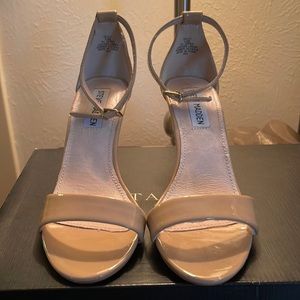 Steve Madden ankle strap heel.